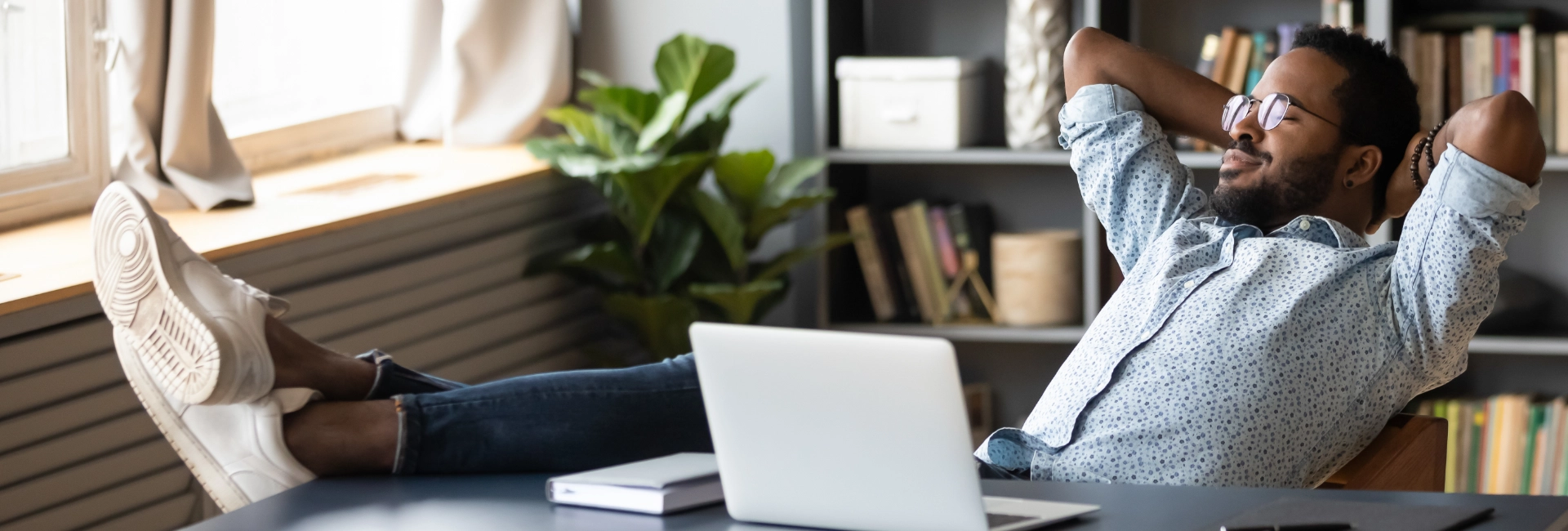 Man Relaxing While Waiting On His Commercial Quote 1920X650